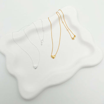 Flowing Heart-Shaped Sterling Silver Necklace